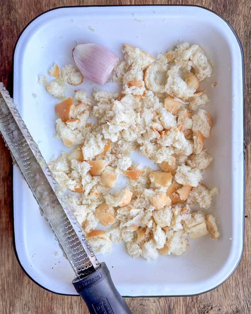 Soak the torn bread in the juice of grated shallots.
