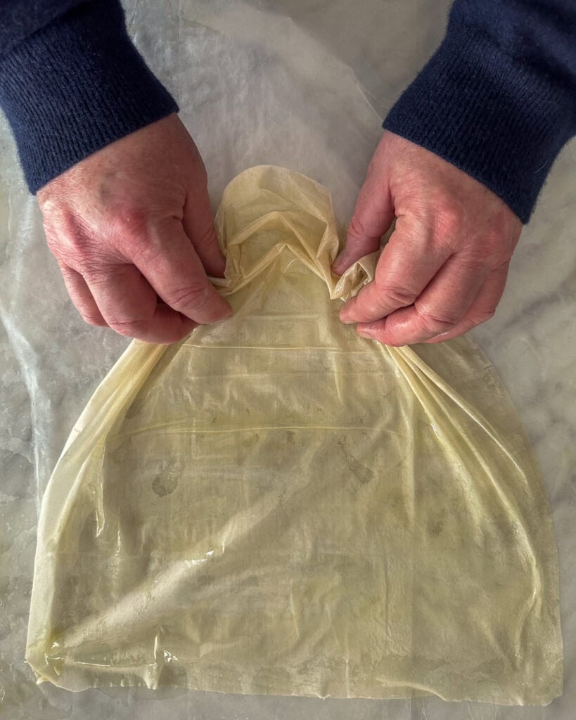 Step 2: Scrunch and push the phyllo from all ends.