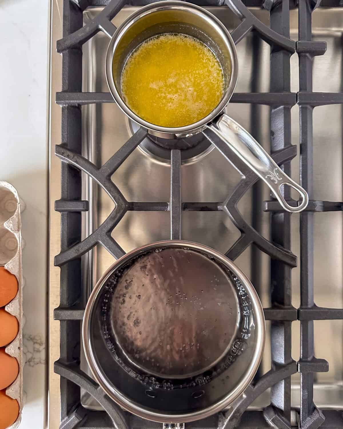 Simmer the water and melt the butter in separate pots.