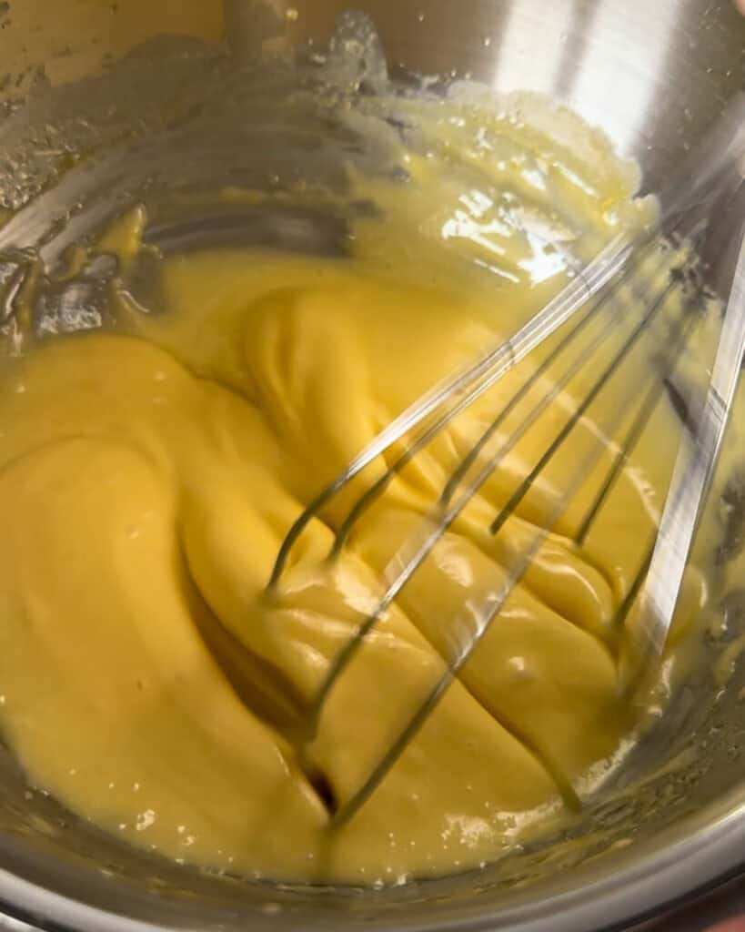 Whisk continuously, until the sauce is smooth and creamy.