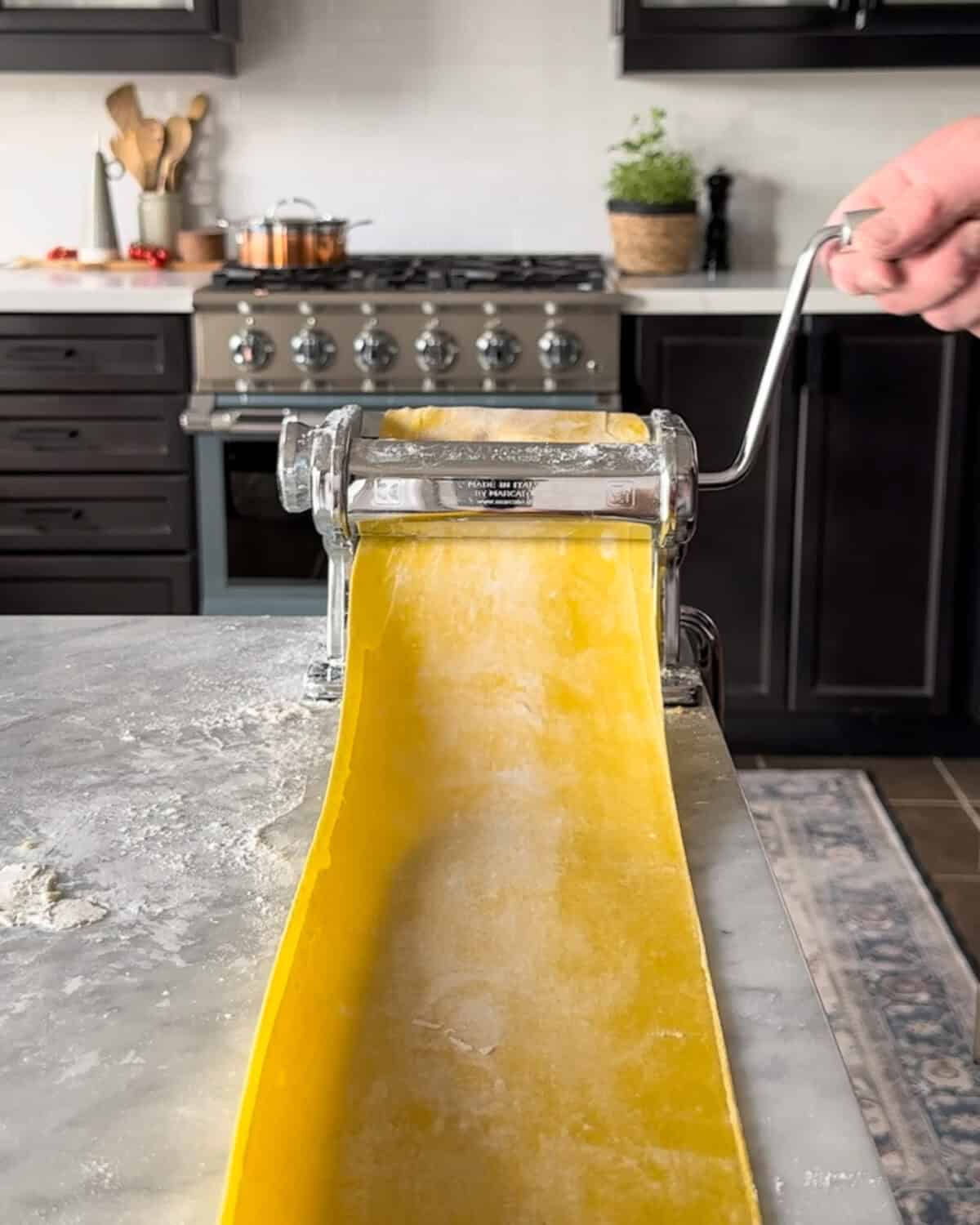Roll out pasta into very thin sheets using a pasta machine or a rolling pin.