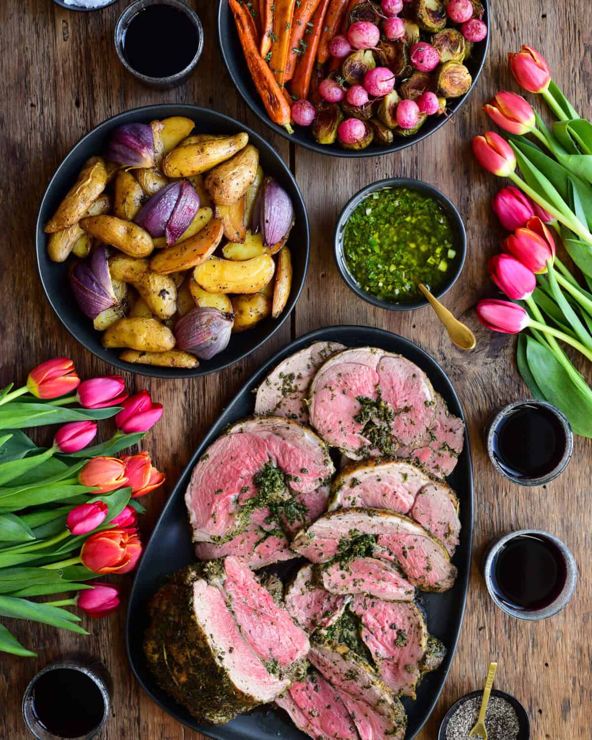 Carve the Herb Stuffed Boneless Leg of Lamb into slices and serve alongside the roasted fingerling potatoes and red onion wedges and your favourite vegetables.