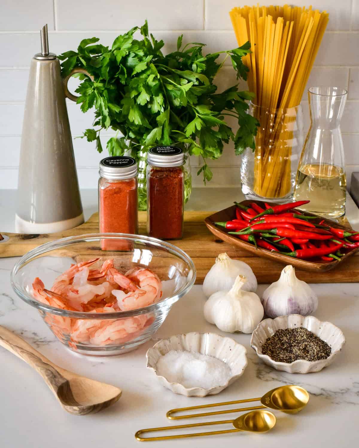 Ingredients for a spicy garlic shrimp pasta recipe.