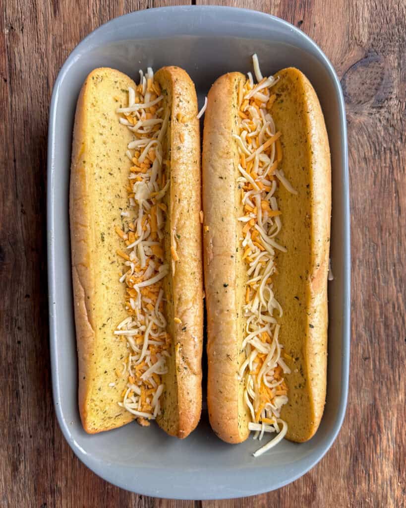 Add a sprinkle of cheese to the bottom of the bread V’s. This will act as a bit of a glue to help hold their shape.