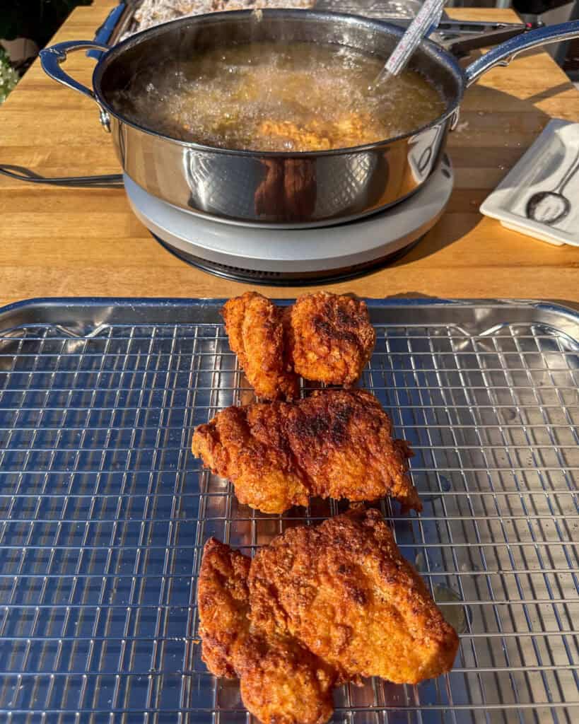Place onto a rack and keep warm in the oven. Repeat with remaining chicken.