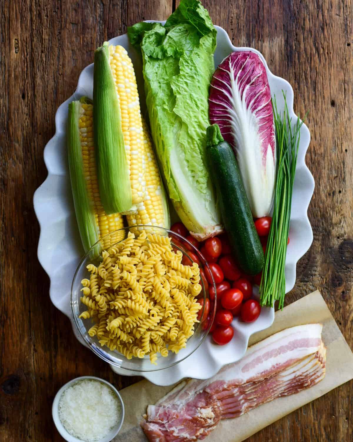 Ingredients for a BLT pasta salad recipe.