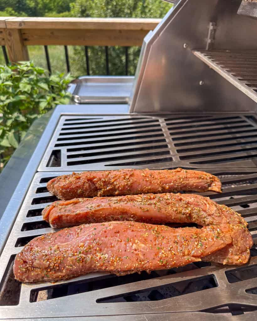 Three pork tenderloins about to get grilled.