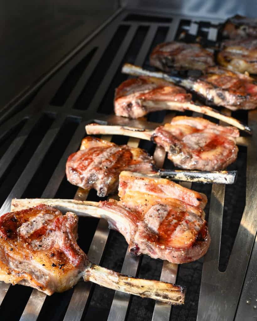 Grilled frenched lamb chops on the grill.