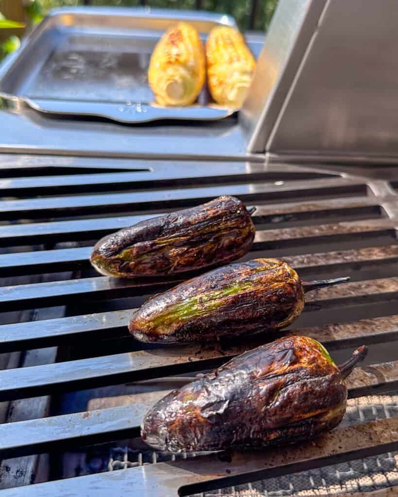 Blistering jalapenos on the grill.