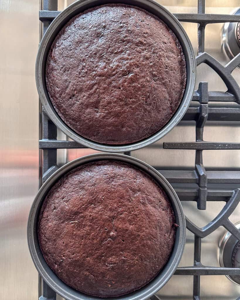 Two baked chocolate zucchini cakes just out to the oven.