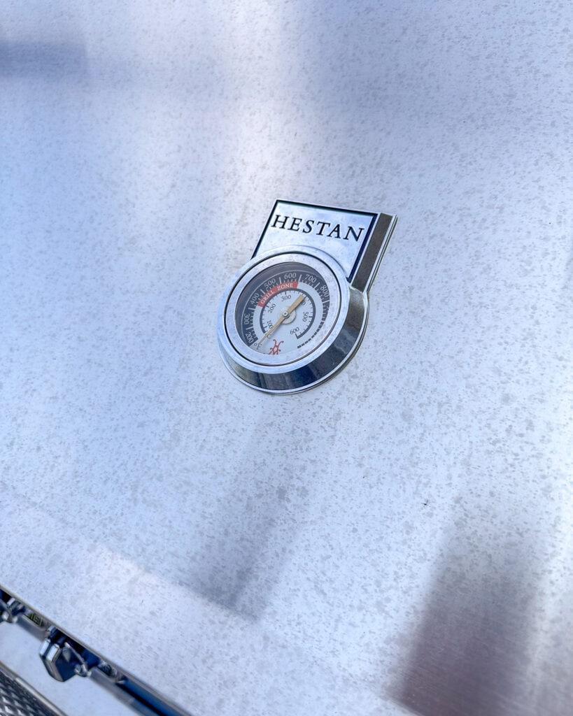 A Hestan grill hood that needs to be cleaned.