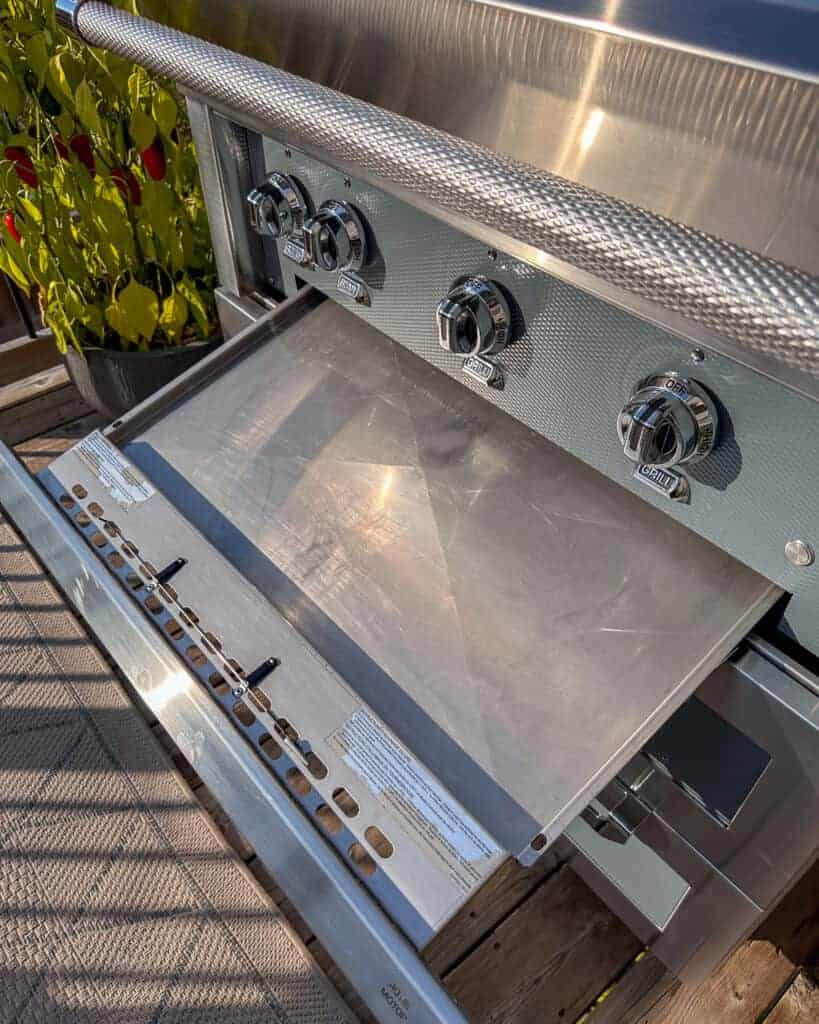 How to clean a gas grill drip pan - once dry, slide back into the grill.