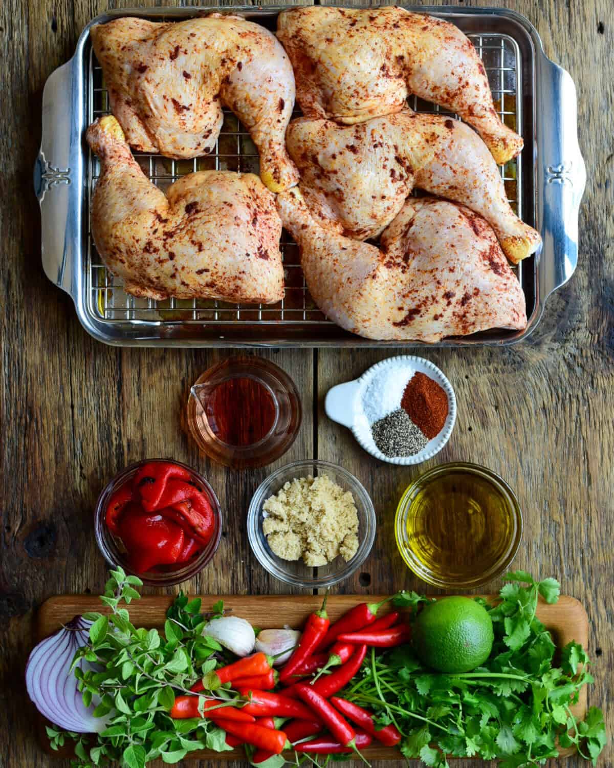 Ingredients laid out for a piri piri sauce & chicken recipe.