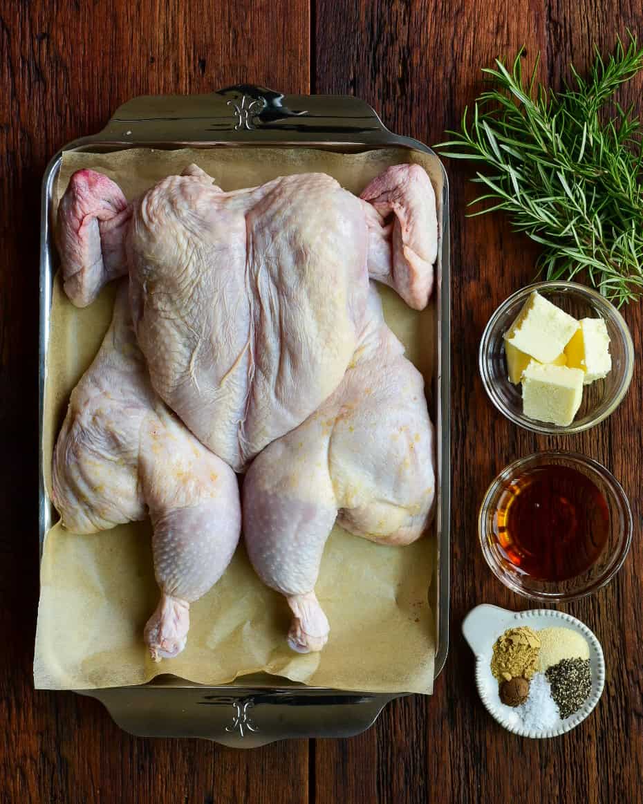 Ingredients for a roasted chicken with maple butter and rosemary recipe.