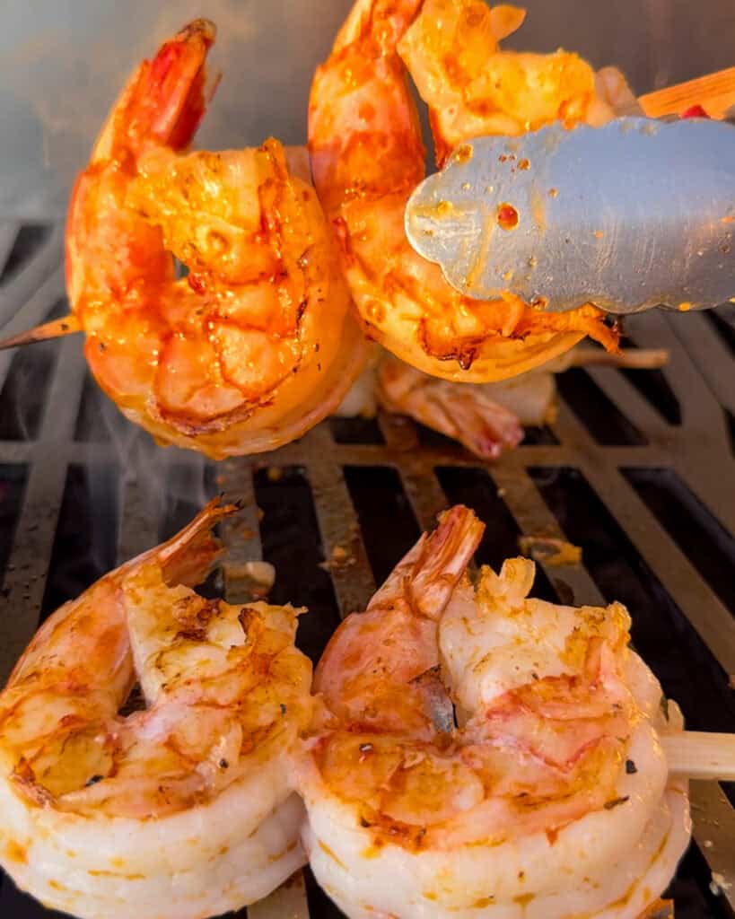 Grill the shrimp for for 2-3 minutes per side, until they are opaque and cooked through.