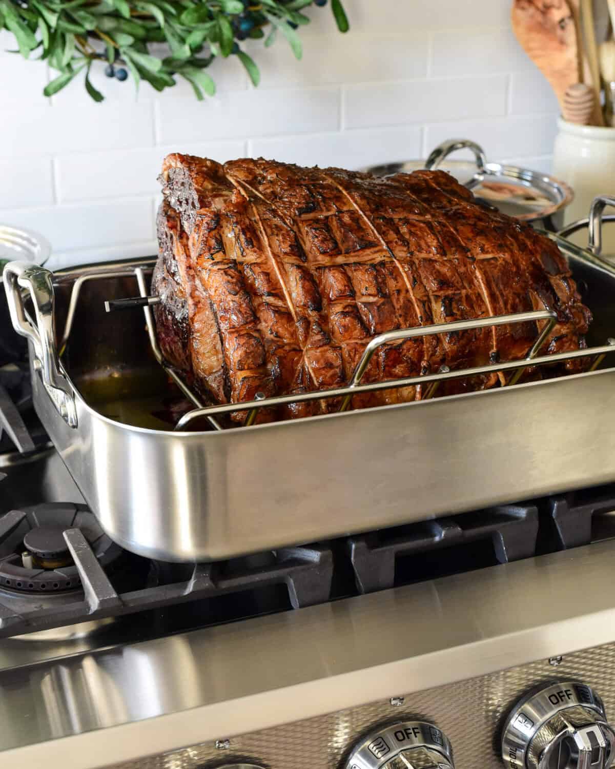 An oven roasted bone in prime rib in a roaster.