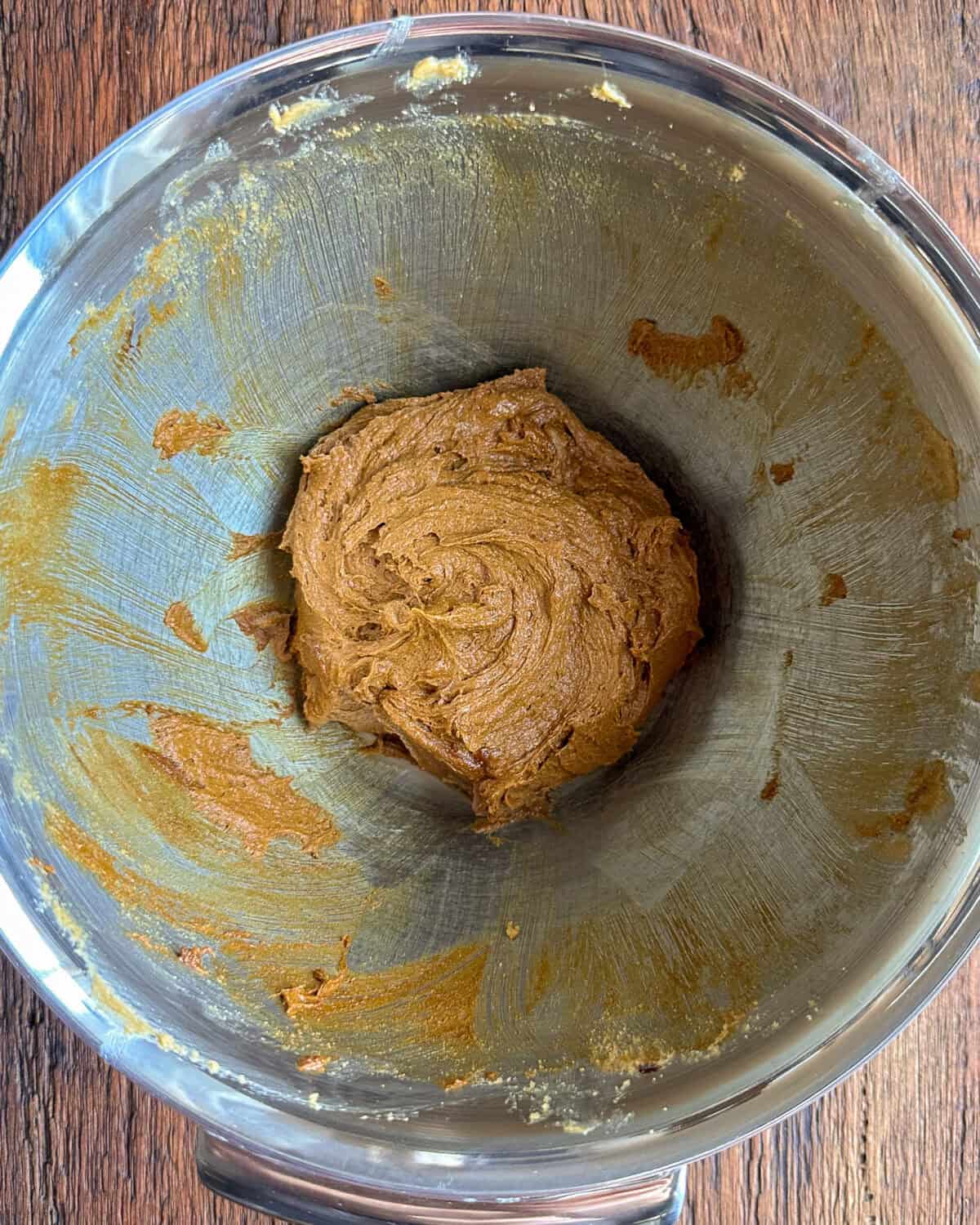 Wet ingredients for gingerbread cookies mixed in a bowl.