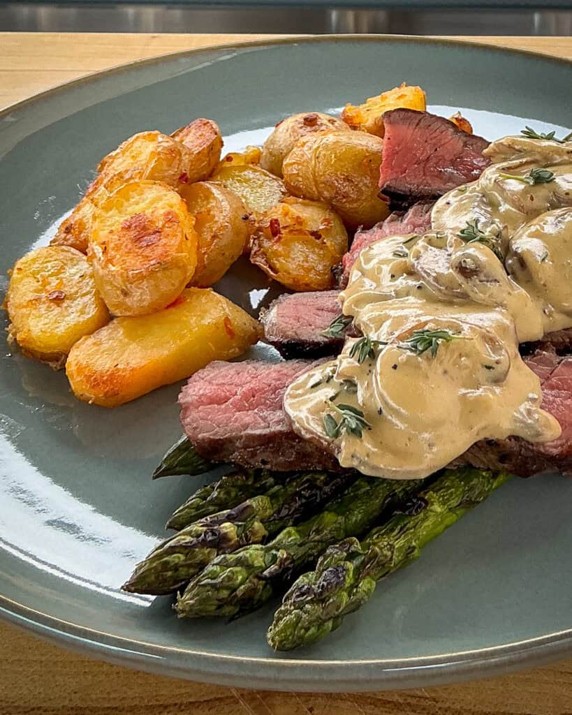 Trader Joe's bomba sauce potatoes served with grilled steak.