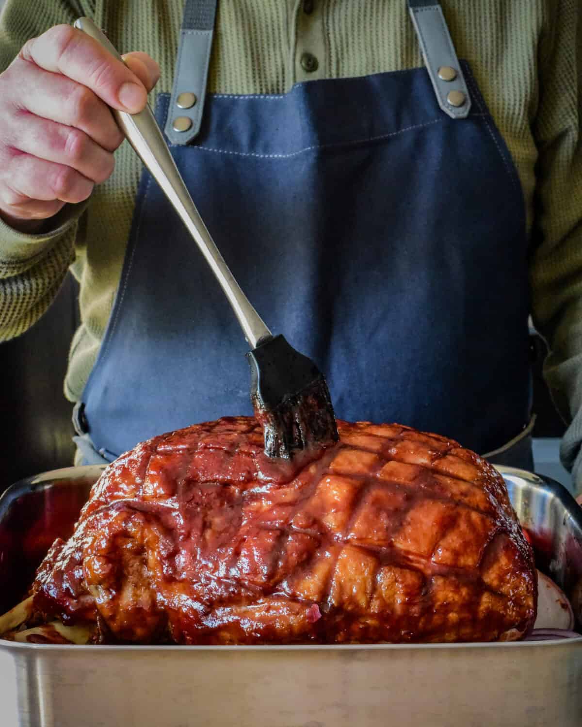 Brush the ham all over with a good layer of the spiced plum glaze