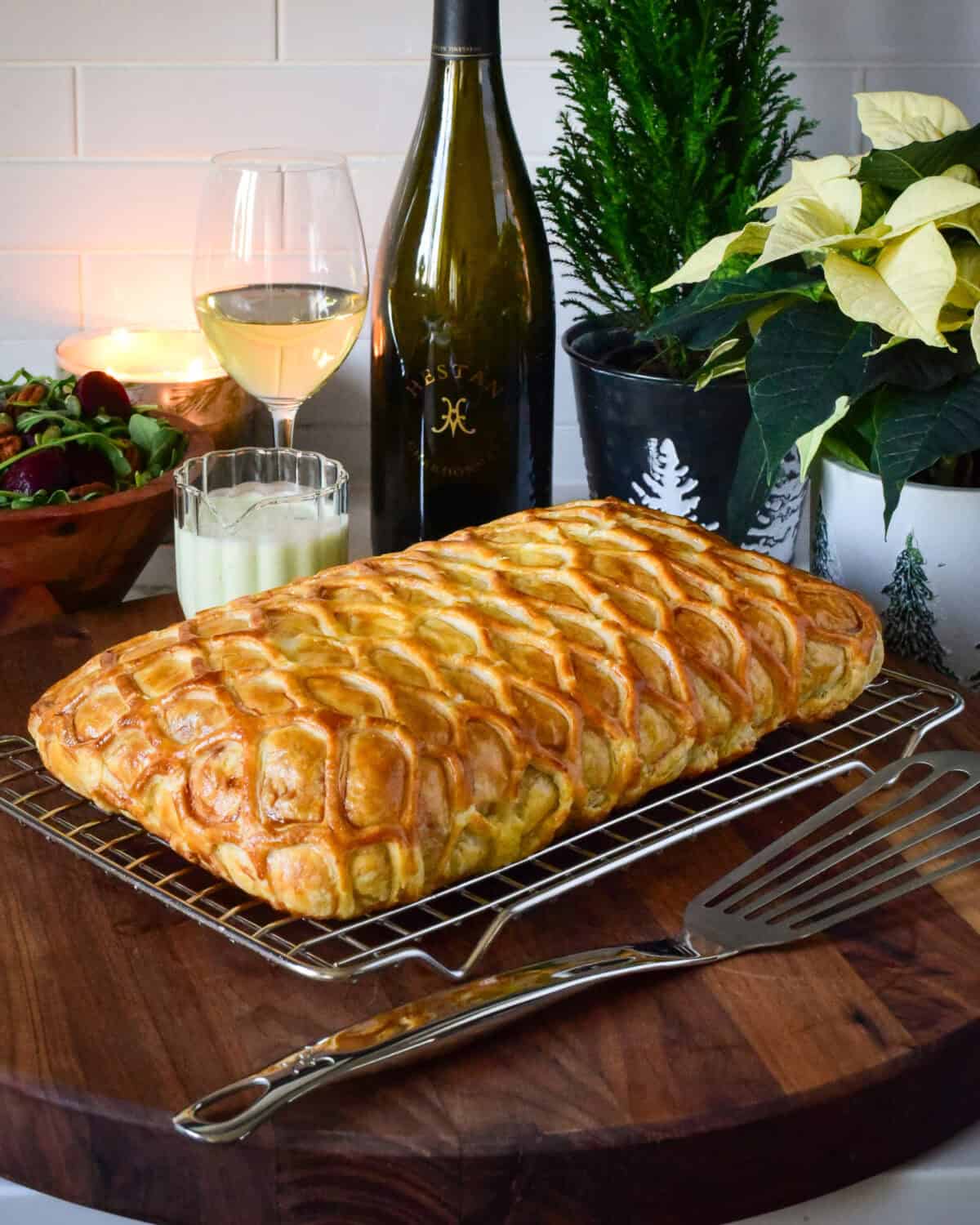 A baked salmon in a lattice puff pastry.