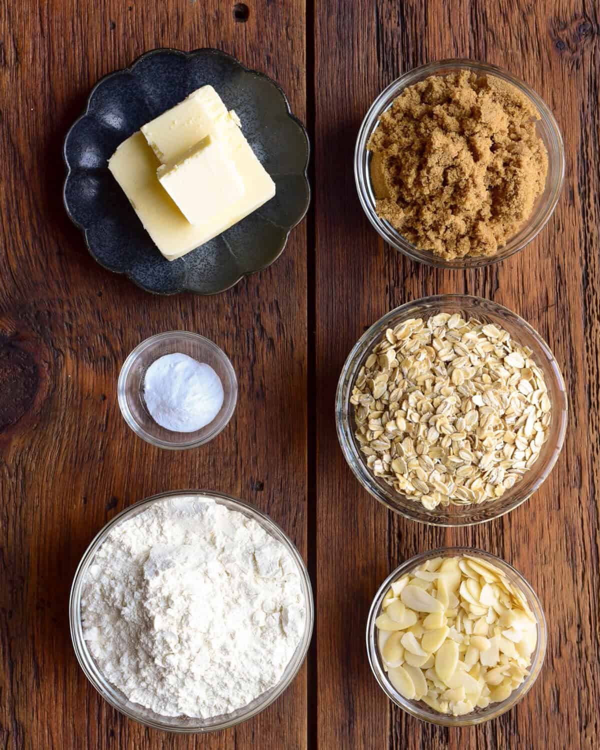 Topping ingredients for a winter fruit crisp recipe.