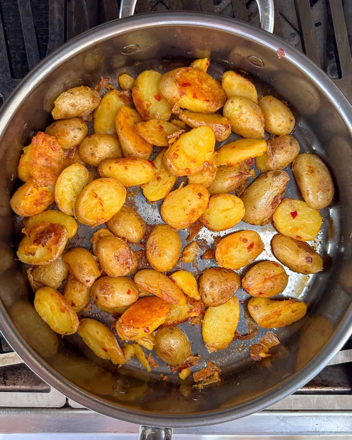 Bomba Potatoes in a skillet.