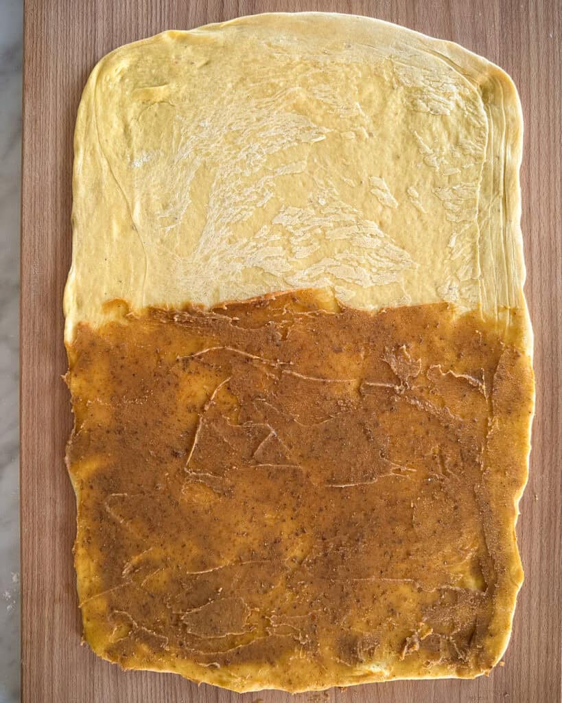 Spread the filling evenly over half of the dough.