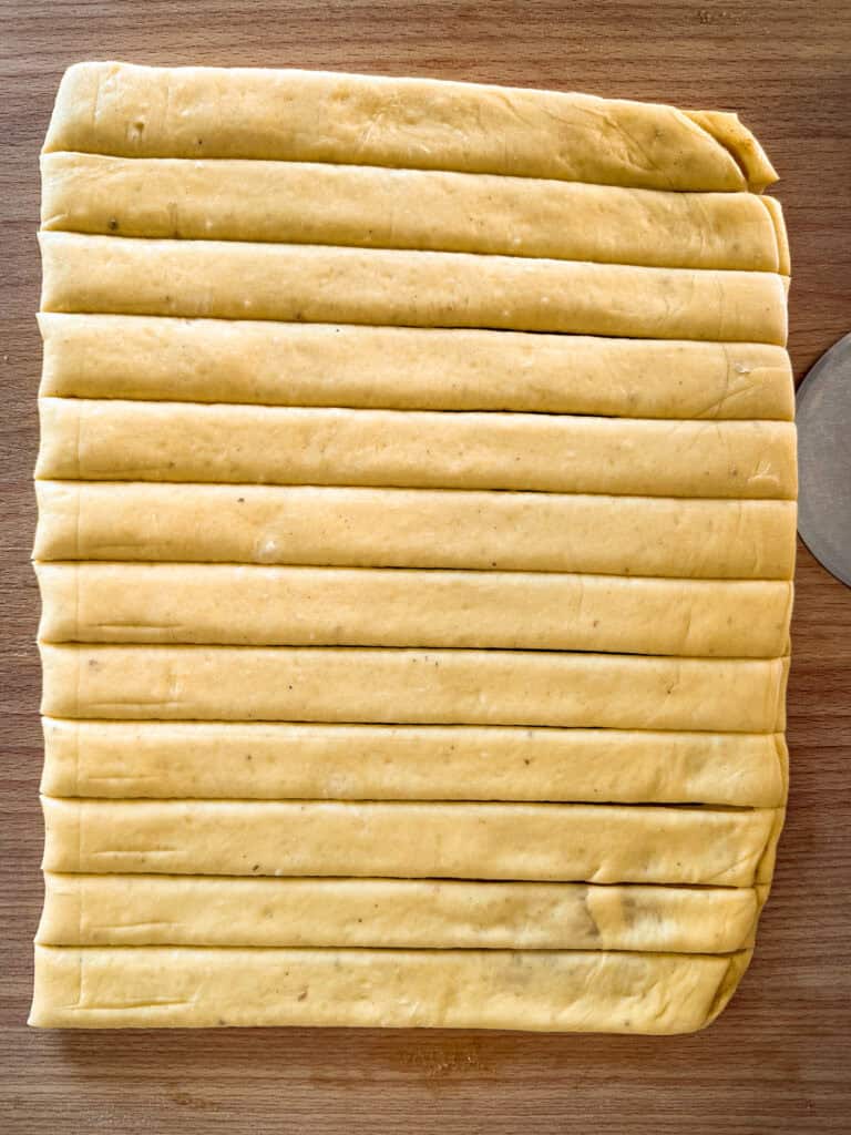Orange Cardamom Buns - cut dough into strips