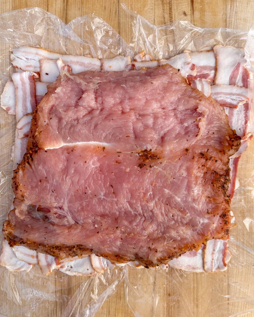 1. Place the flattened turkey breast over the bacon weave.