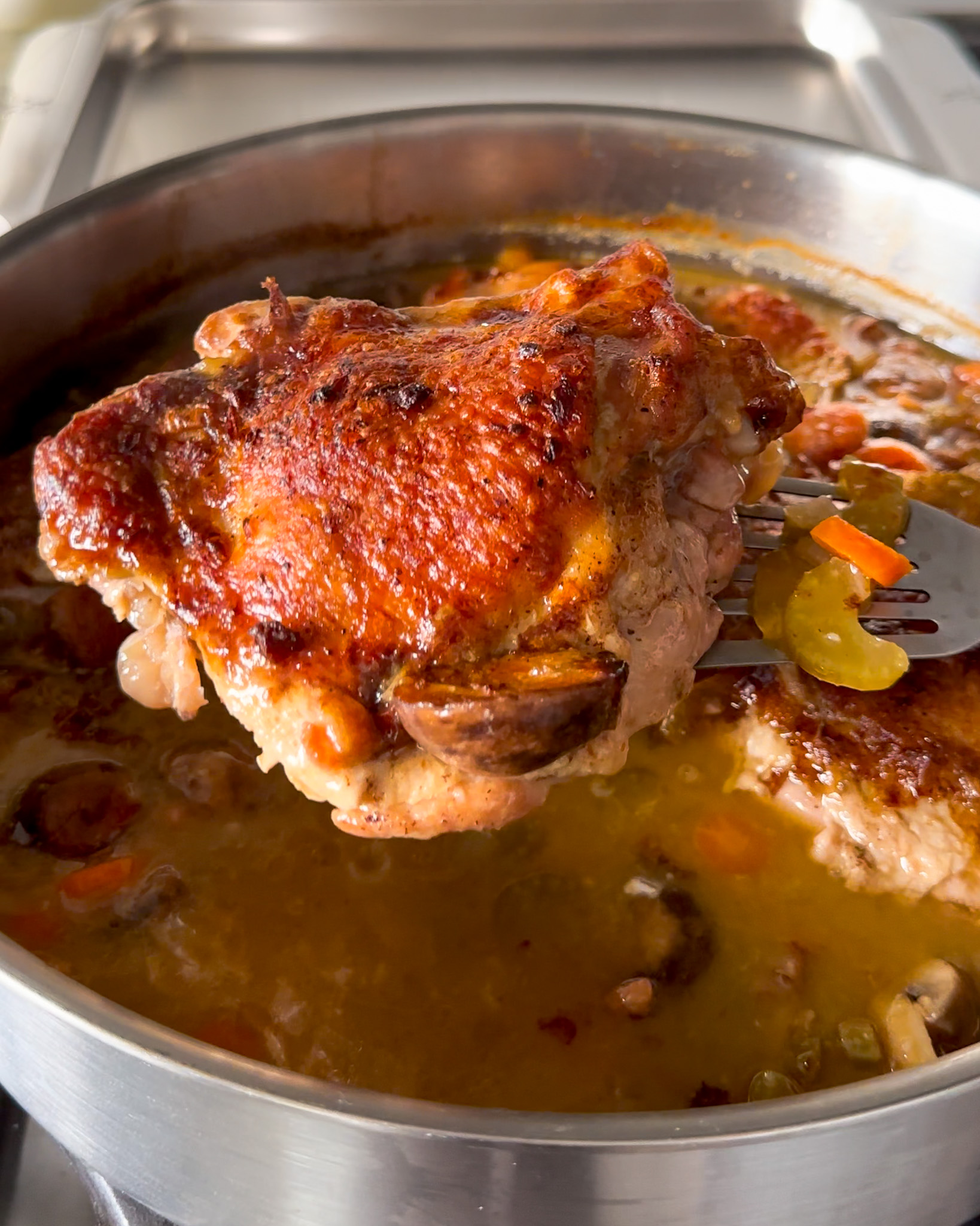 Remove turkey thighs from the au vin rosé sauce.