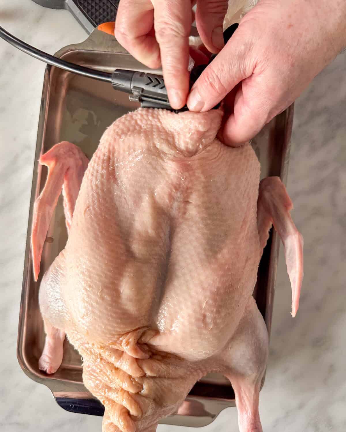 To get crispy skin on a Roasted Duck - Peking Style, use a bicycle pump to separate the skin from the meat.