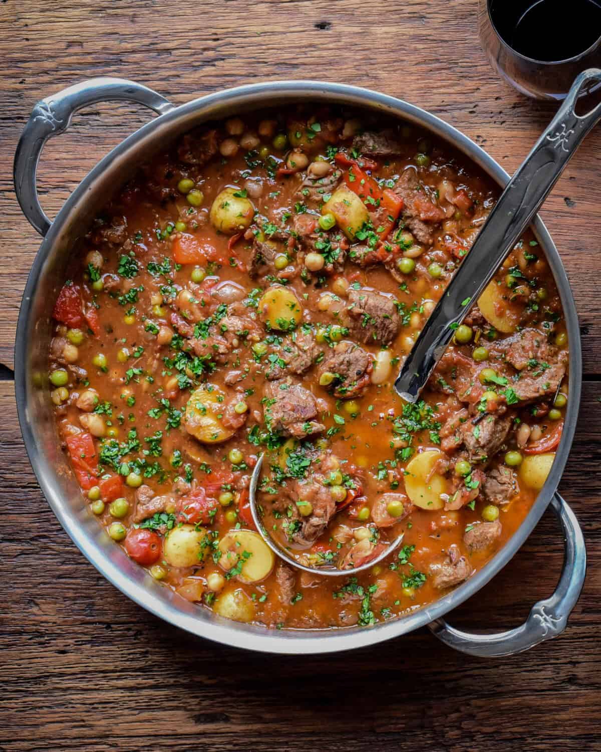 Add the peas, stirring to combine and cook until warmed through.