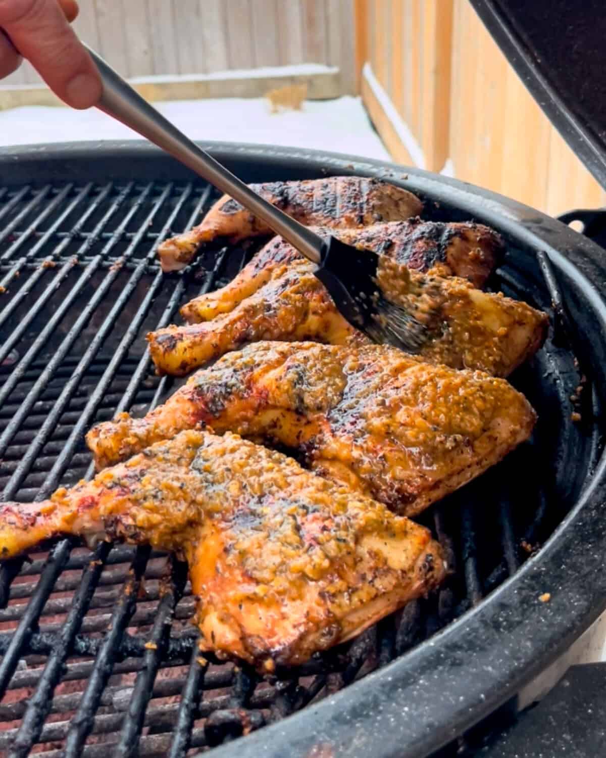 Brush the marinade over the Jerk Chicken Leg Quarters.