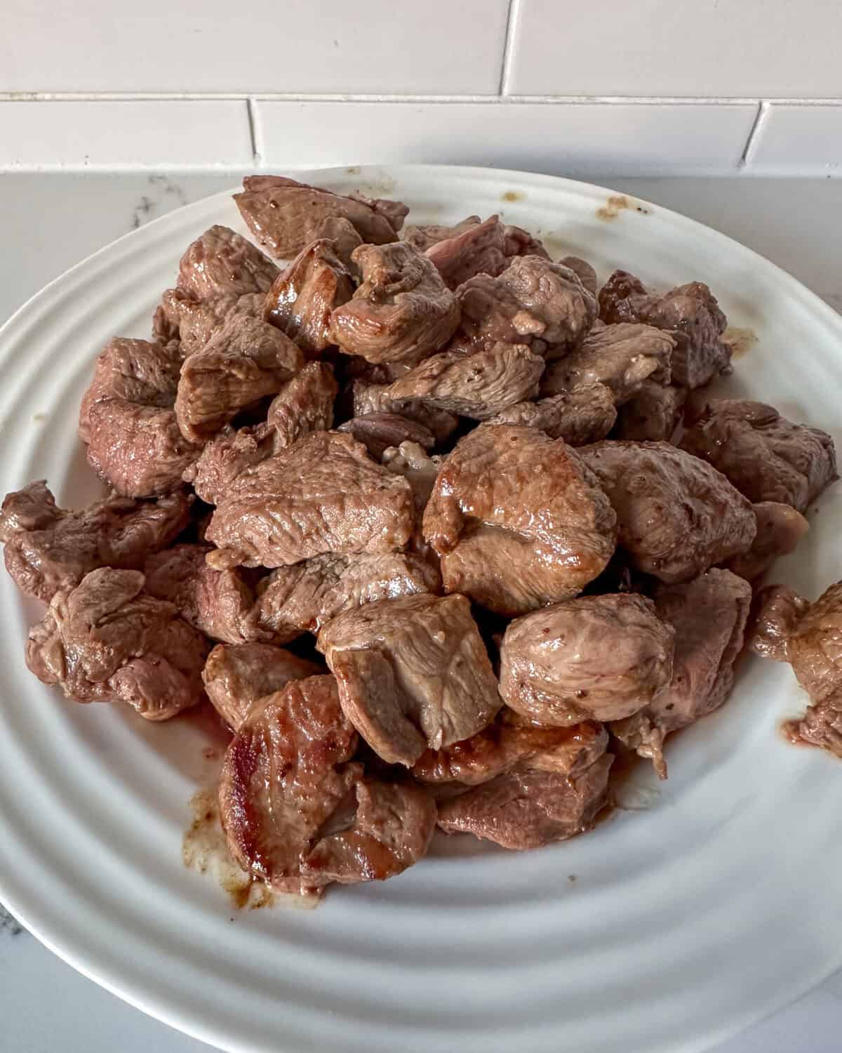 Transfer the lamb to plate and set aside.