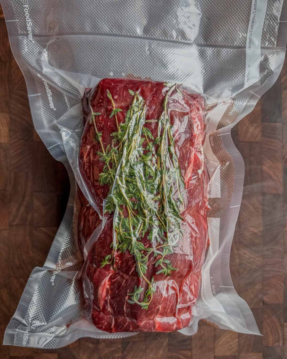 Place the roast in a vacuum-seal bag with the thyme sprigs