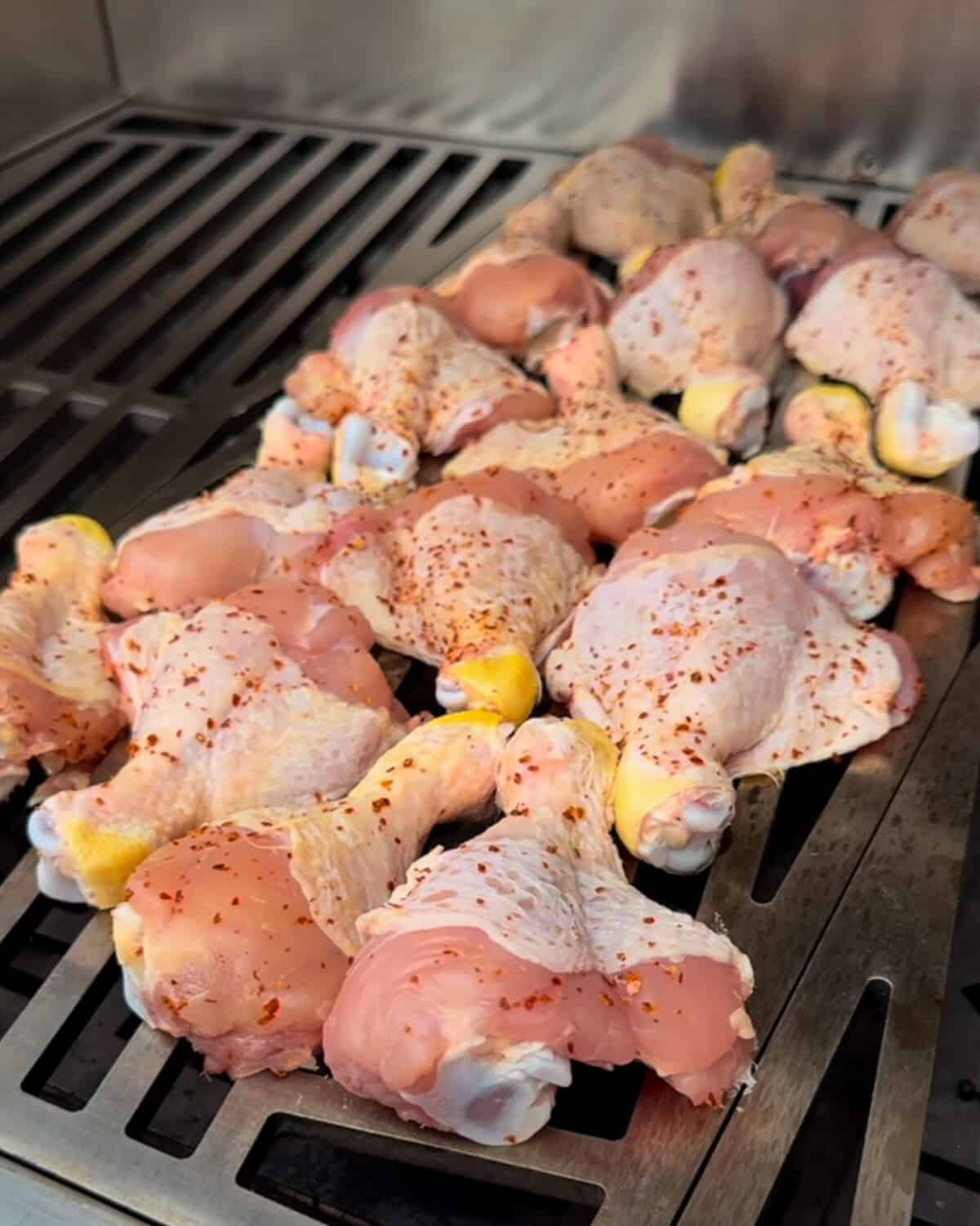 Place the butterflied chicken drumsticks, cut side down, over indirect heat