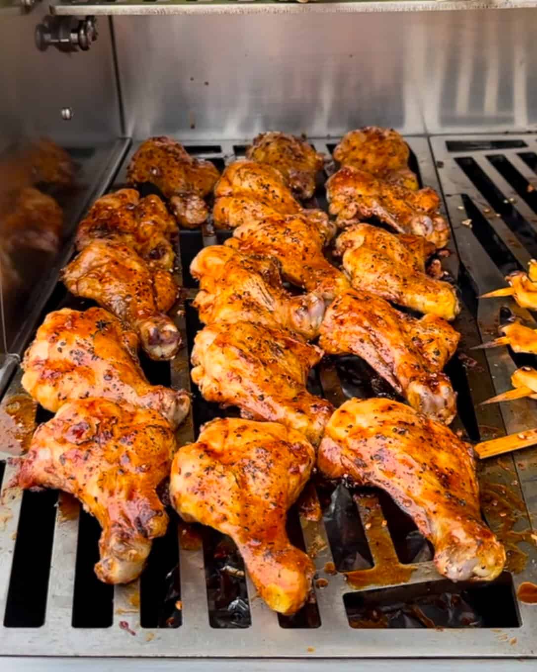 Place the butterflied chicken drumsticks on heat zone and grill for an additional 5-10 minutes.