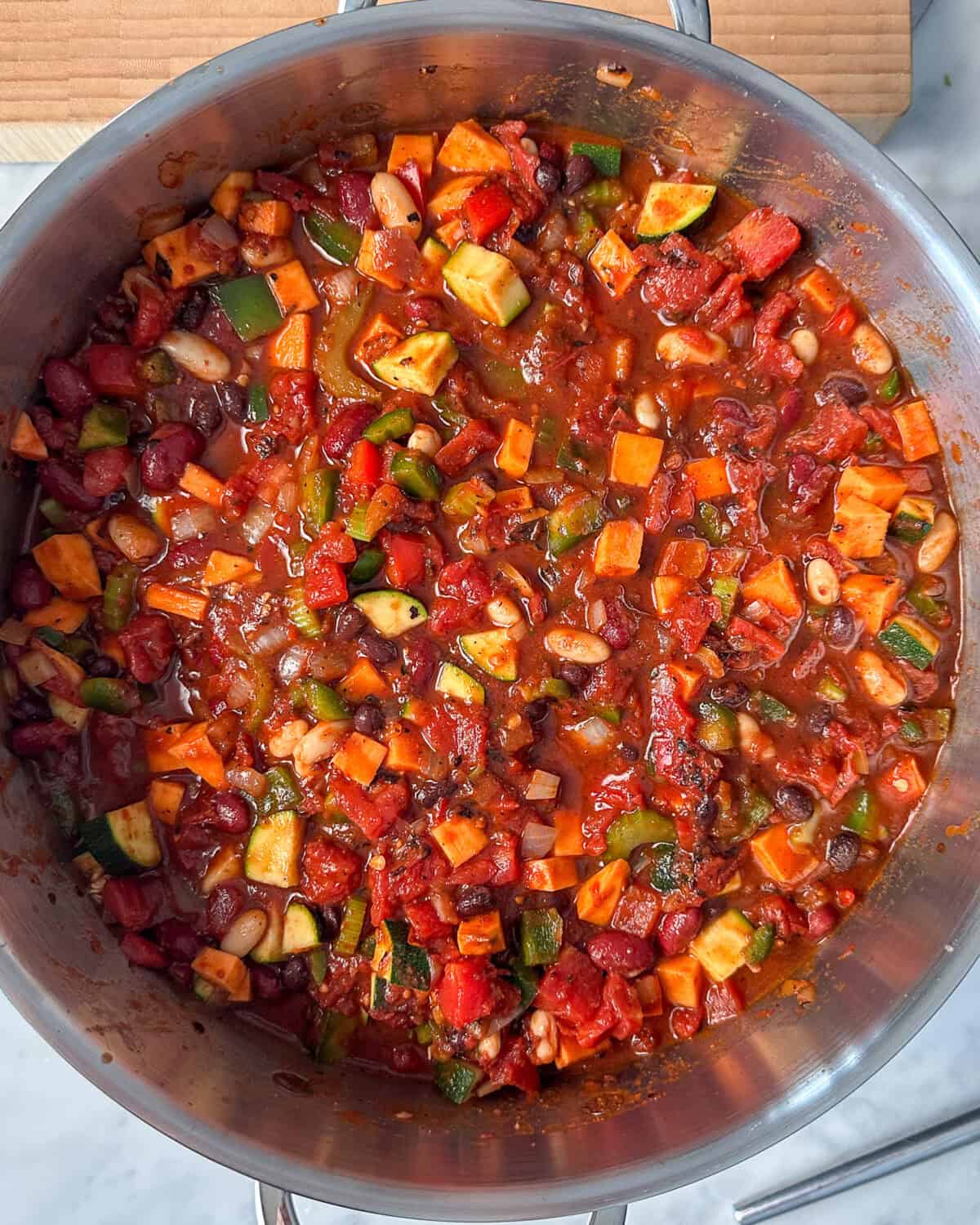 A large pot of Low-Sodium Vegetable Chili ready for simmering.
