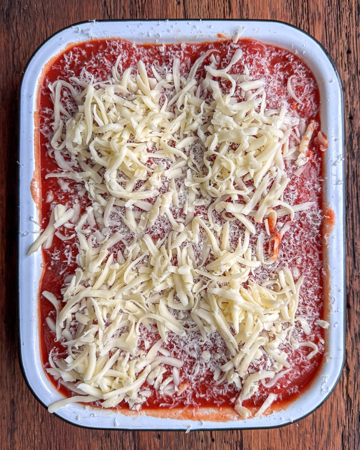 Sprinkle each breast with the reserved Parmesan and mozzarella cheeses.