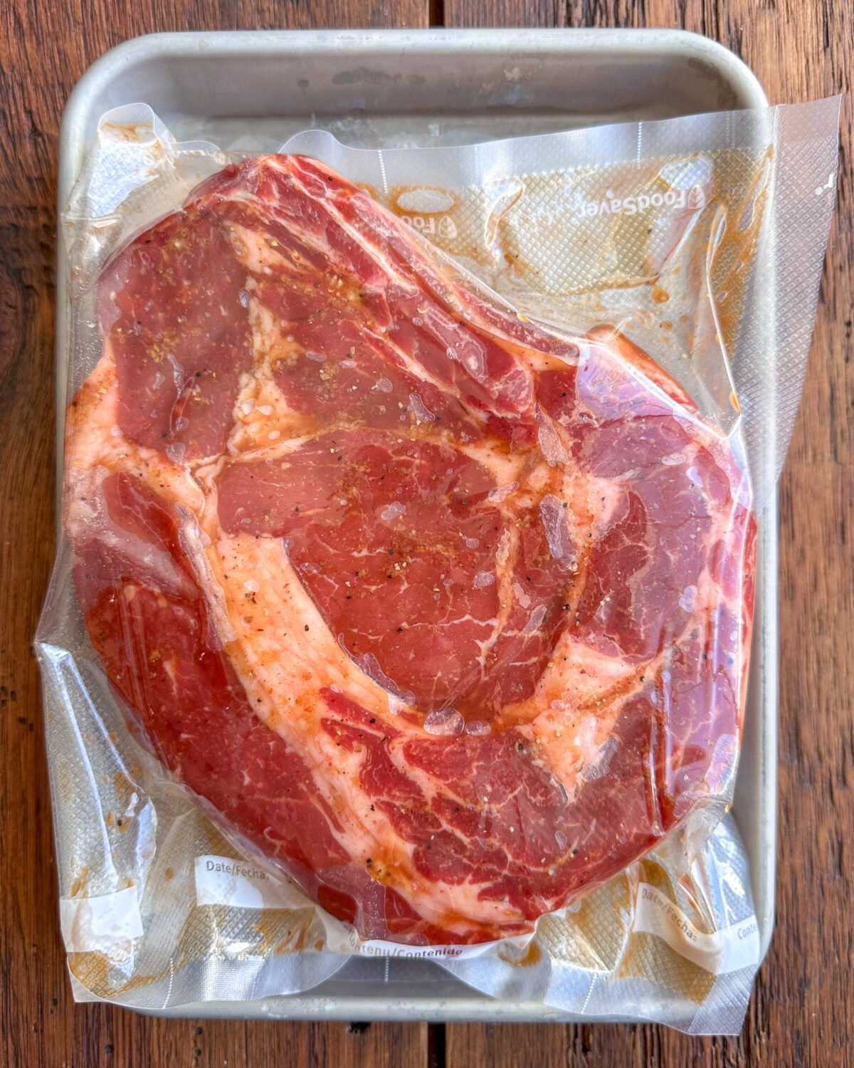 A marinated roast in a vacuumed sealed bag.