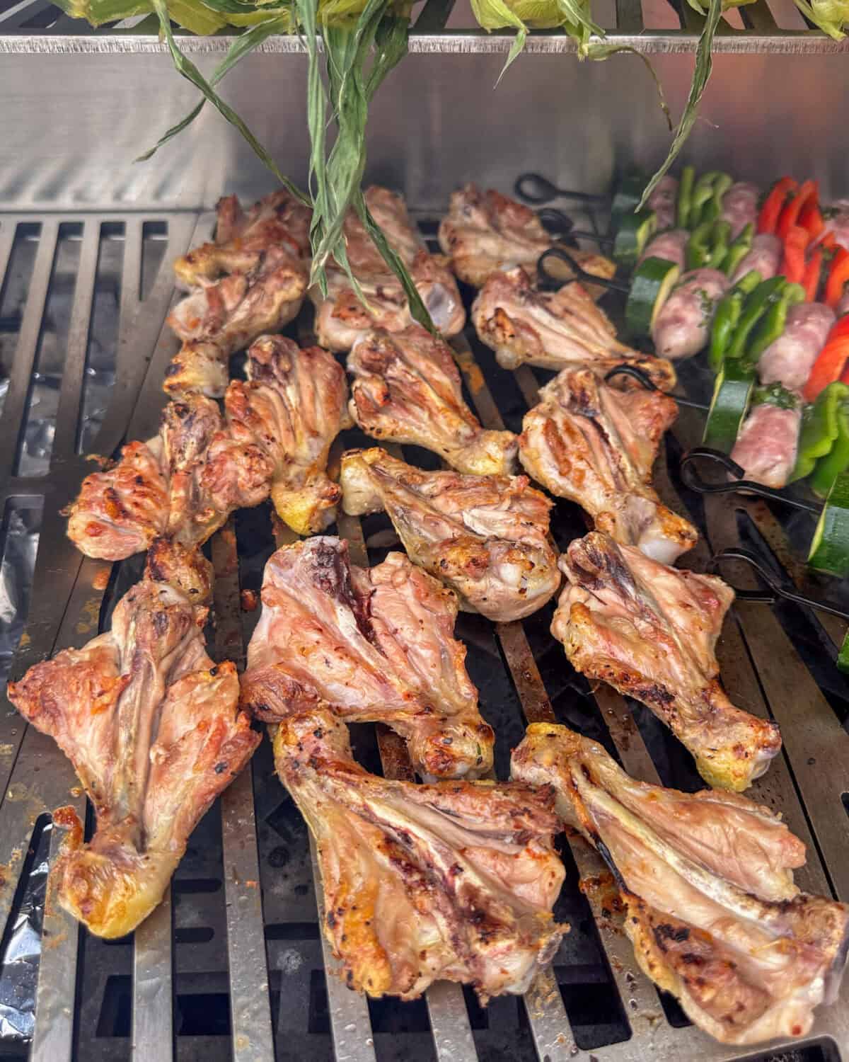 Grilled butterflied chicken drumsticks.