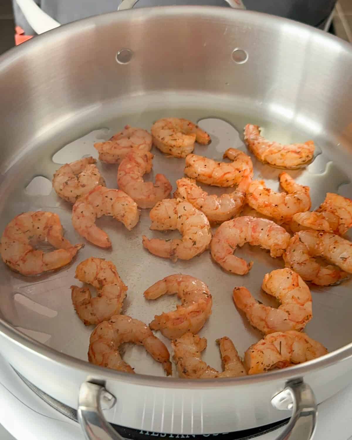 Searing shrimp for a Shrimp Étouffée recipe.