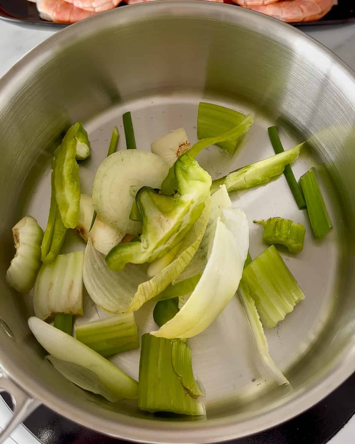 Vegetable trimmings for shrimp stock.