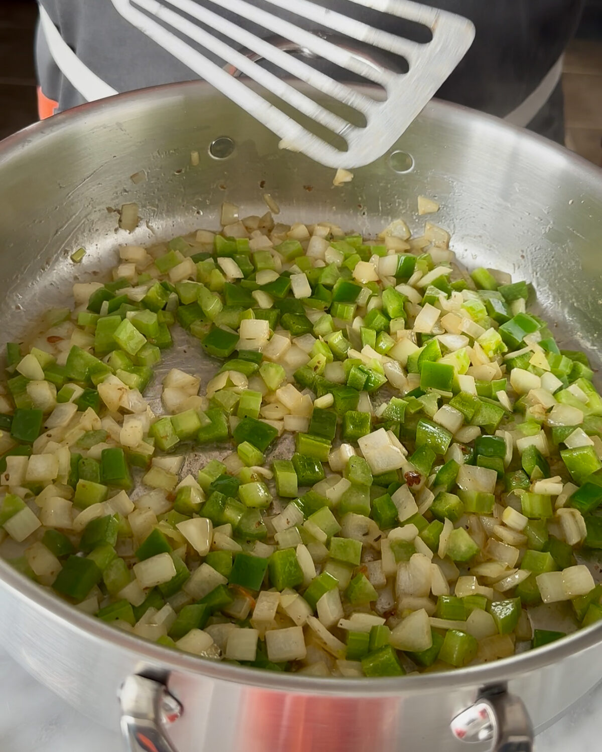 Sauté the holy trinity for the Shrimp Étouffée recipe.