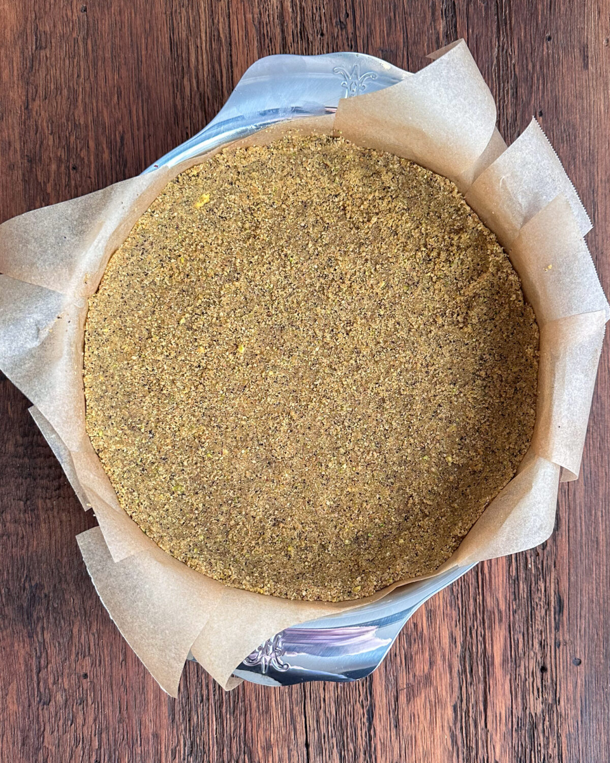 Press the mixture firmly into the bottom and 1 ½ inches up the sides of the pan.