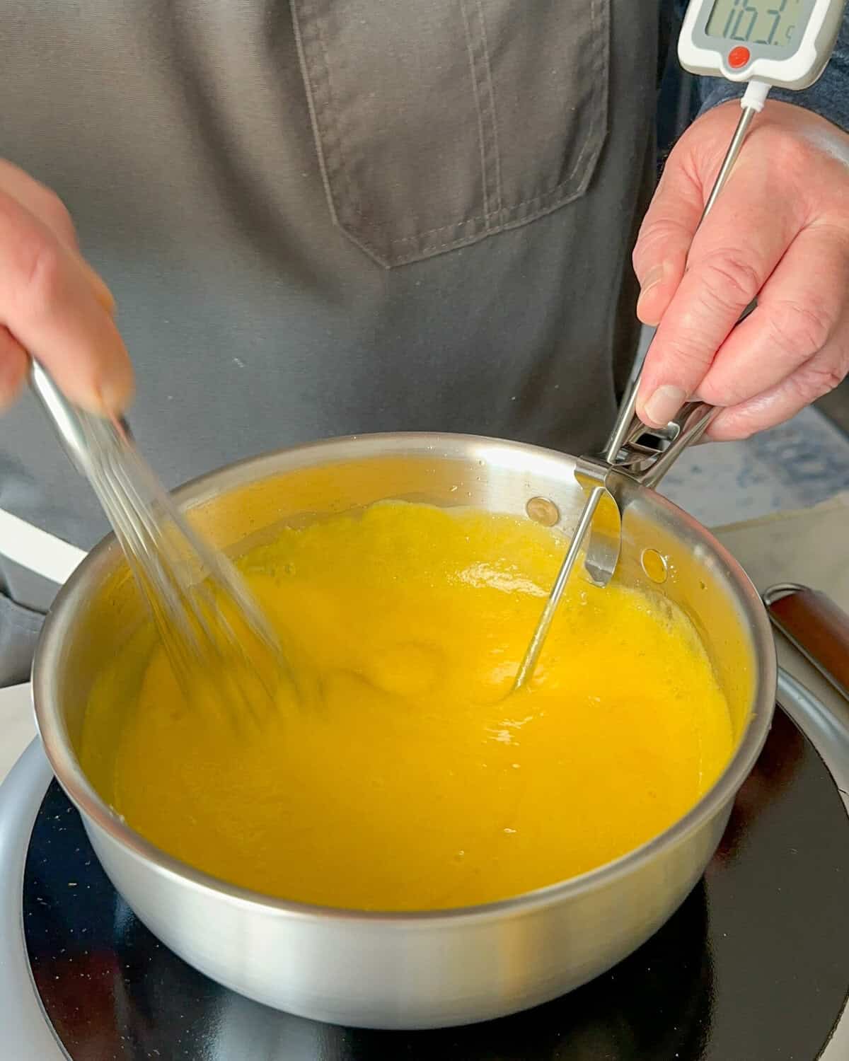 Cook the lemon pie curd over low heat, whisking constantly, until the mixture reaches 170°F (about 10-15 minutes). The curd should thicken to a custard-like consistency.