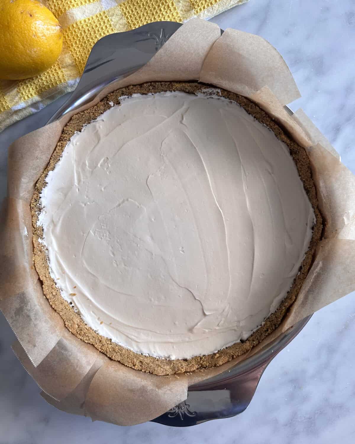 Spread evenly with an offset spatula over the prepared pie crust and refrigerate for 3-4 hours before adding the lemon curd.