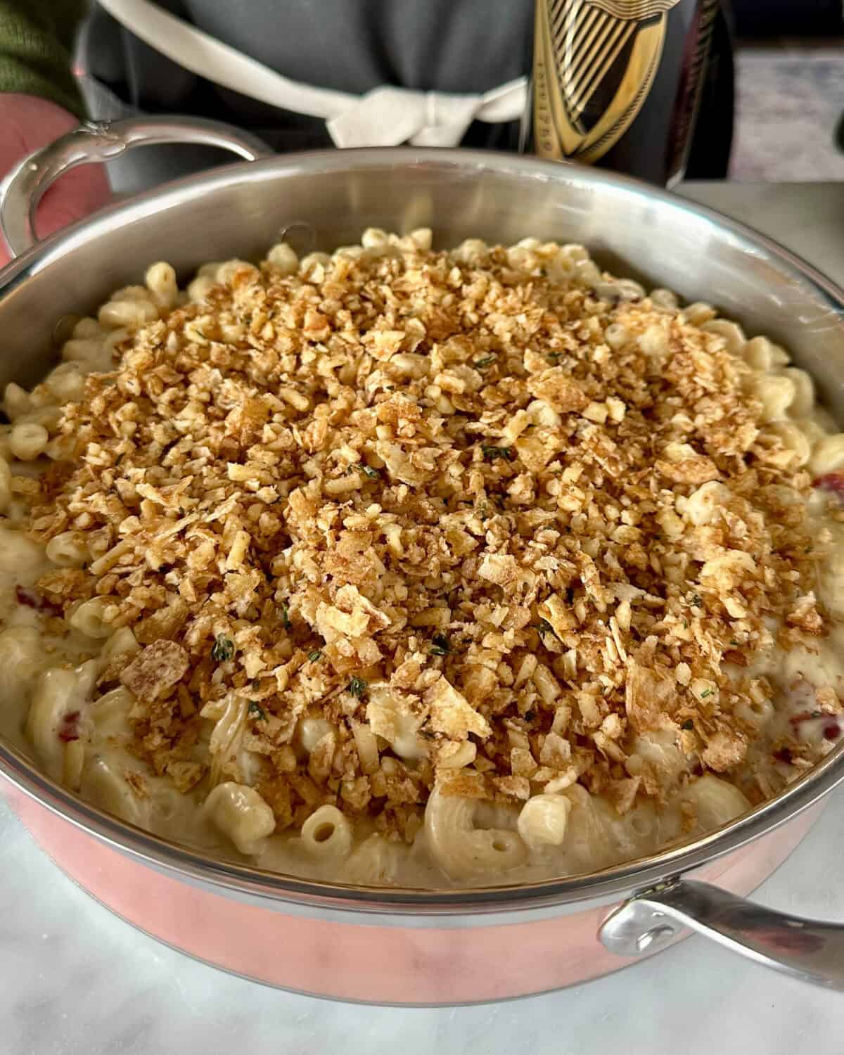Sprinkle the herbed chip topping evenly over the top of the 3 cheese mac and cheese.