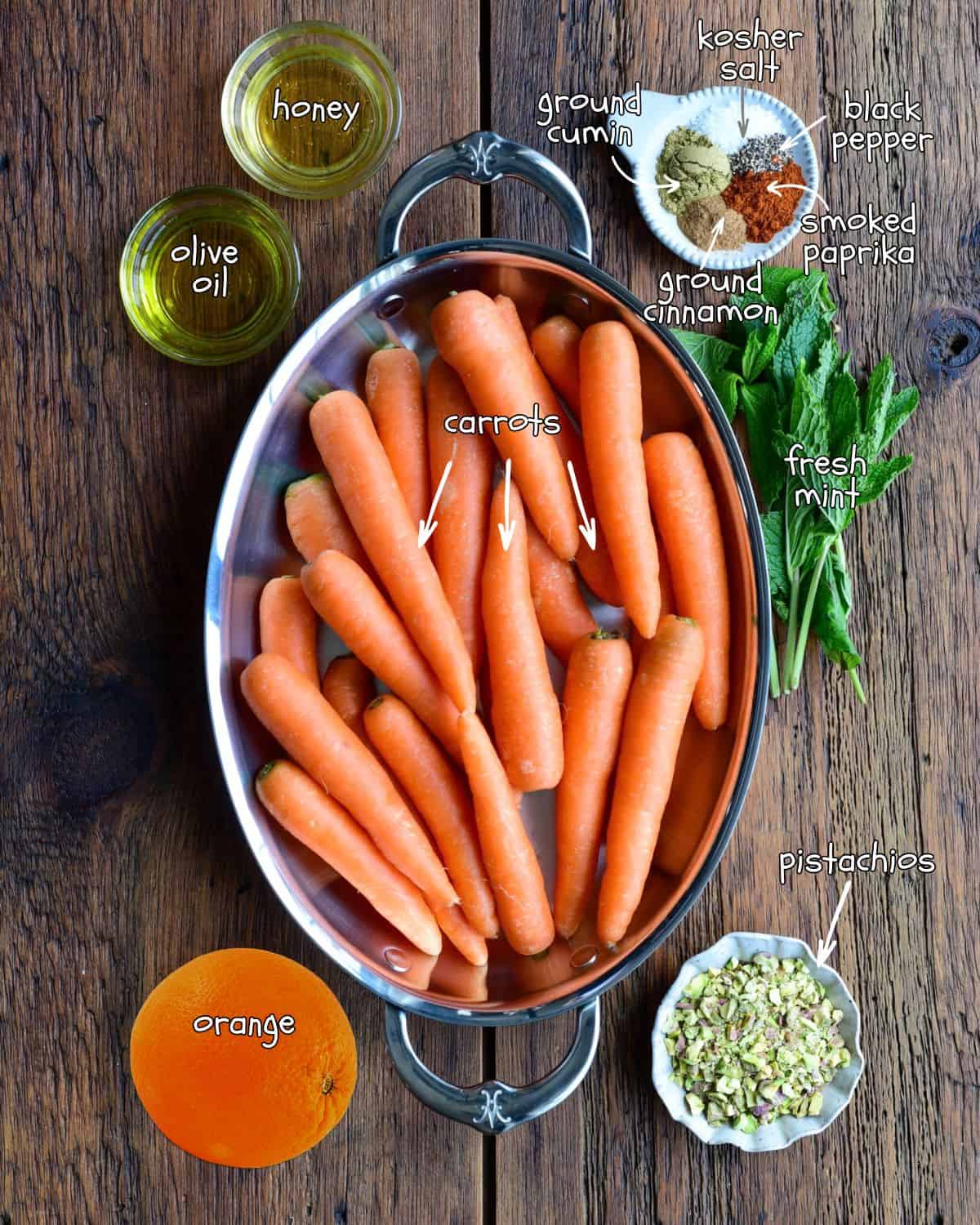 Ingredients for a Spiced Honey-Roasted Carrots with Orange & Pistachios recipe.