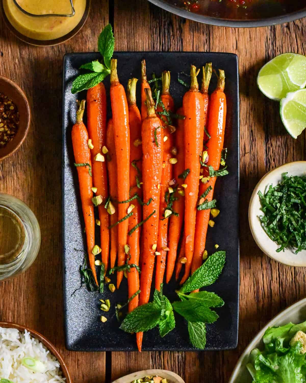 Spiced honey-roasted carrots topped with mint and pistachios.